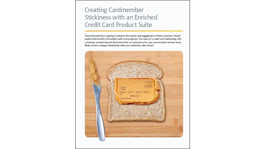 Image of a wooden table top showing a slice of bread which has just been spread with peanut butter using a silver knife. There is an imprint of a credit card is pressed into the peanut butter on top of the bread. Text above the image reads "Creating Cardmember Stickiness with an Enriched Credit Card Product Suite"